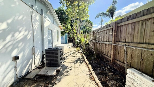 802 Lytle St, West Palm Beach, FL 33405 - fenced backyard featuring cooling unit