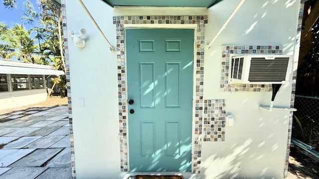 802 Lytle St, West Palm Beach, FL 33405 - doorway to property with stone siding
