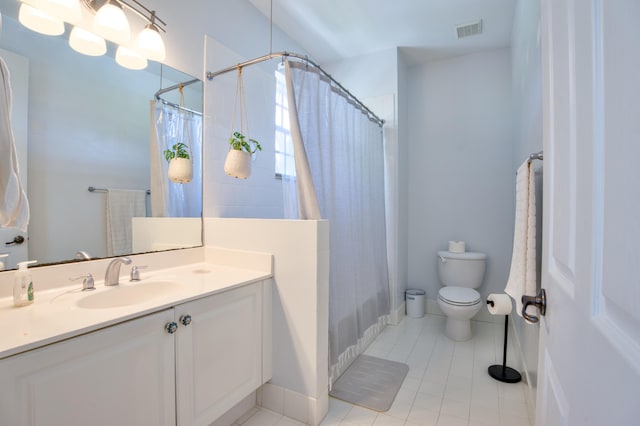 1020 E Longport Cir Unit A1, Delray Beach, FL 33444 - full bathroom with vanity, tile patterned floors, toilet, shower / bath combo, and baseboards