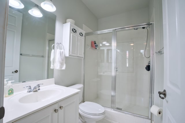 1020 E Longport Cir Unit A1, Delray Beach, FL 33444 - bathroom featuring toilet, a stall shower, and vanity