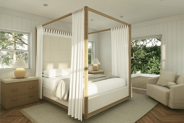 227 Greymon Dr, West Palm Beach, FL 33405 - bedroom featuring multiple windows and wooden walls