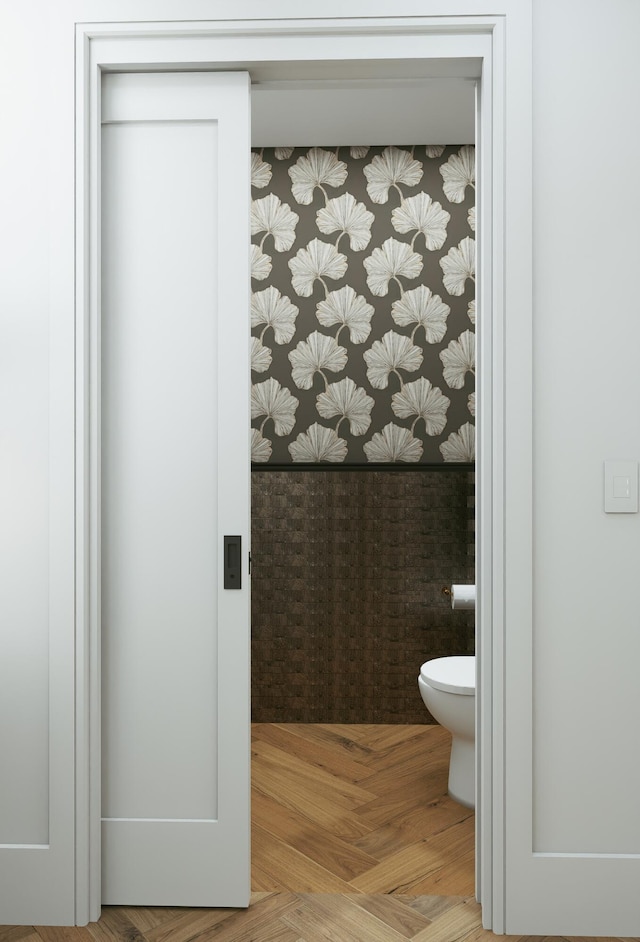 227 Greymon Dr, West Palm Beach, FL 33405 - bathroom with toilet and wallpapered walls