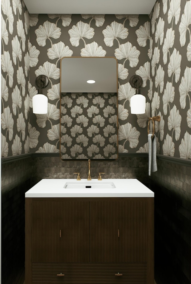 227 Greymon Dr, West Palm Beach, FL 33405 - bathroom featuring a sink and tile walls