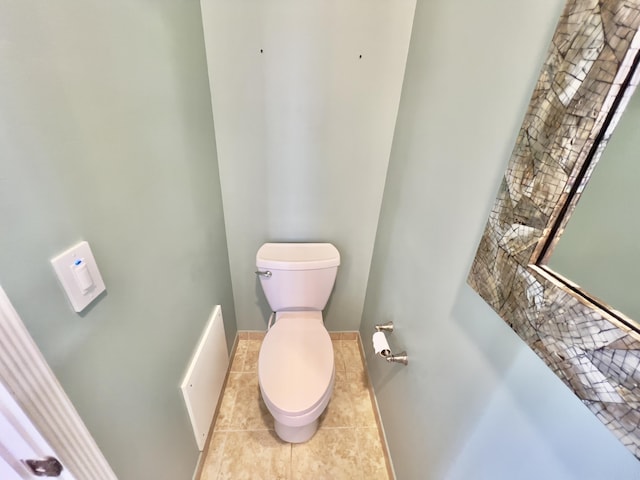8300 NW 9th Ave, Boca Raton, FL 33487 - bathroom with toilet, tile patterned floors, and baseboards
