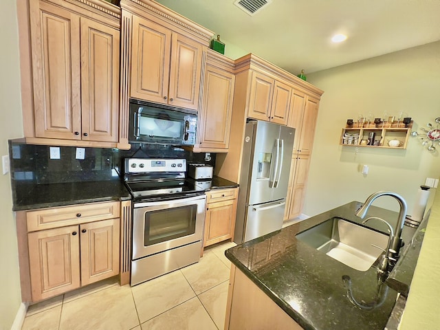 8300 NW 9th Ave, Boca Raton, FL 33487 - kitchen with stainless steel appliances, a sink, light tile patterned floors, decorative backsplash, and light brown cabinets