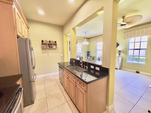 8300 NW 9th Ave, Boca Raton, FL 33487 - kitchen featuring a sink, appliances with stainless steel finishes, light tile patterned floors, ceiling fan, and dark stone counters