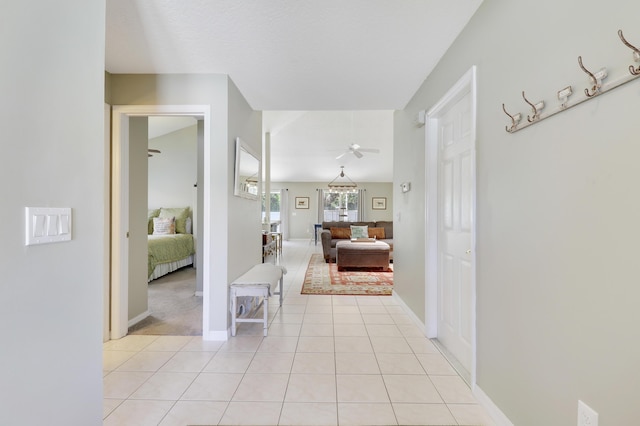 4393 SE Scotland Cay Way, Stuart, FL 34997 - hallway featuring light tile patterned flooring and baseboards