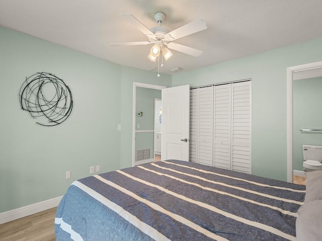 2800 Indian River Blvd Unit J6, Vero Beach, FL 32960 - bedroom with wood finished floors, a closet, and ceiling fan