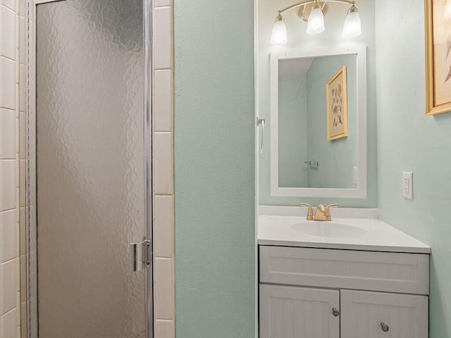 2800 Indian River Blvd Unit J6, Vero Beach, FL 32960 - bathroom with vanity and a shower stall