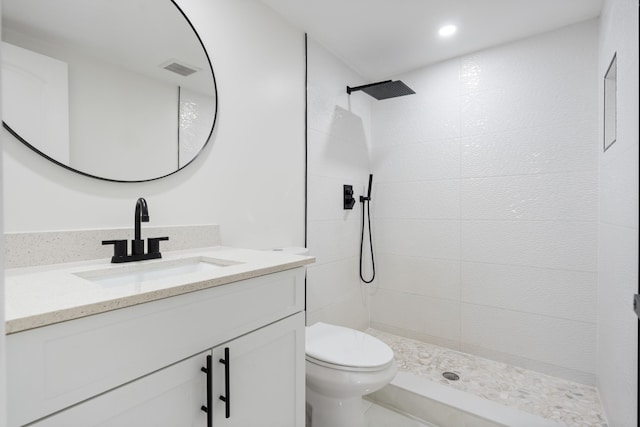 88 3rd St, West Palm Beach, FL 33413 - full bath with walk in shower, vanity, toilet, and recessed lighting