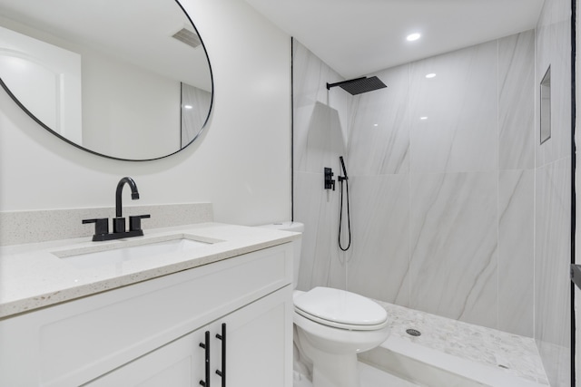 88 3rd St, West Palm Beach, FL 33413 - full bathroom with vanity, a marble finish shower, and toilet