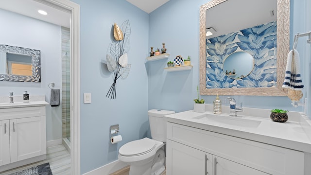21415 Campo Allegro Dr, Boca Raton, FL 33433 - bathroom featuring vanity, toilet, a stall shower, and baseboards