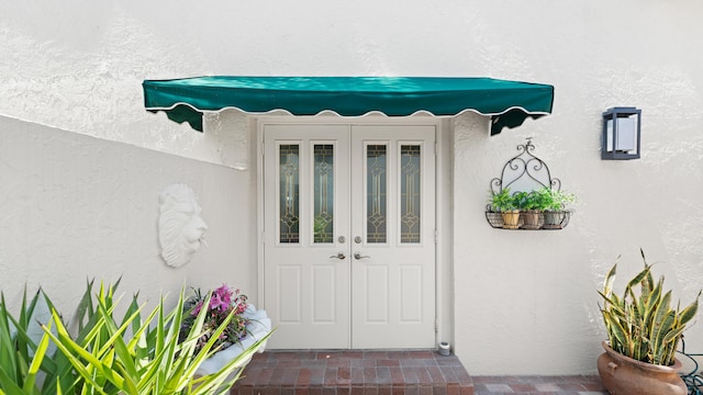 21415 Campo Allegro Dr, Boca Raton, FL 33433 - property entrance featuring stucco siding and french doors