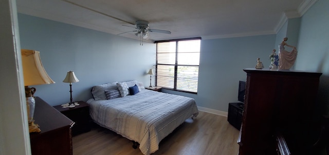 8 Royal Palm Way Unit 6040, Boca Raton, FL 33432 - bedroom with ornamental molding, light wood-style flooring, and a ceiling fan