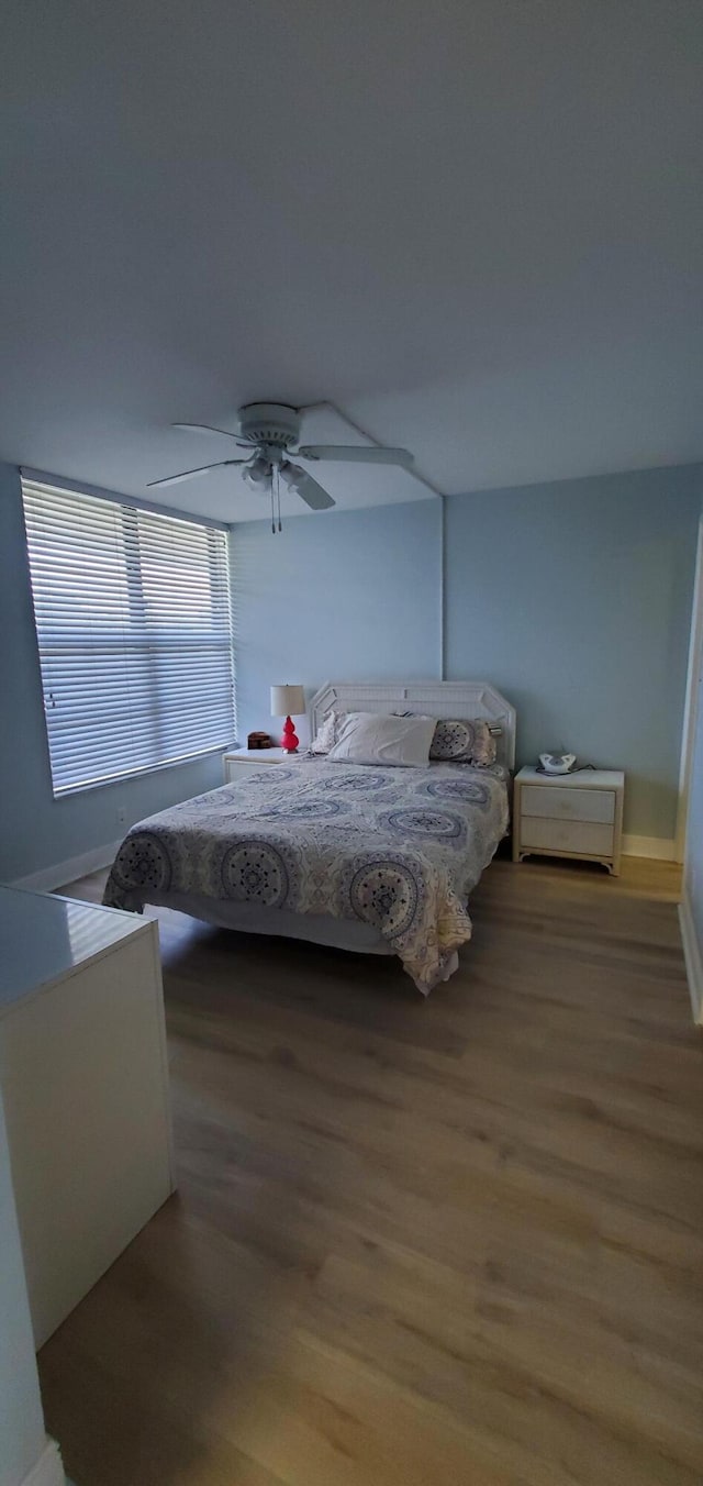 8 Royal Palm Way Unit 6040, Boca Raton, FL 33432 - bedroom featuring wood finished floors and a ceiling fan