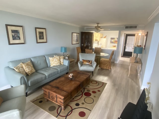 8 Royal Palm Way Unit 6040, Boca Raton, FL 33432 - living area with ornamental molding, wood finished floors, and ceiling fan