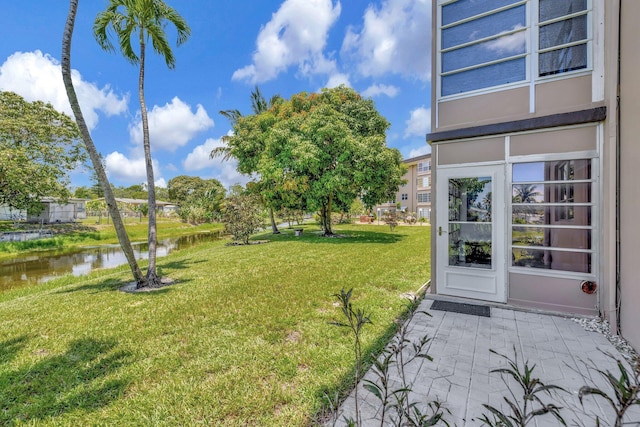 2901 NW 46th Ave Unit 101, Lauderdale Lakes, FL 33313 - view of grassy yard with a water view