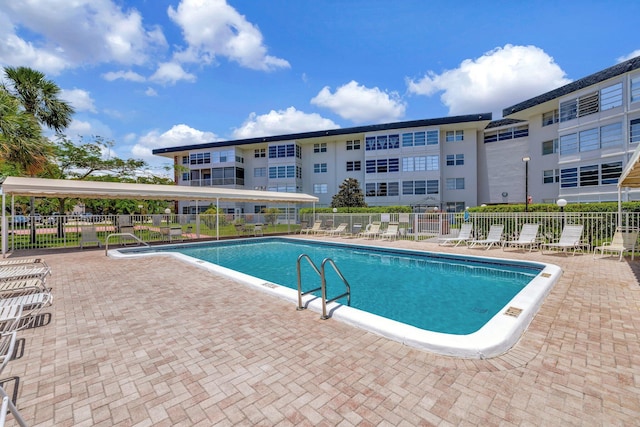 2901 NW 46th Ave Unit 101, Lauderdale Lakes, FL 33313 - community pool with a patio area