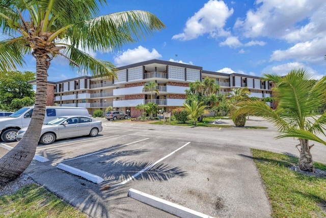 2901 NW 46th Ave Unit 101, Lauderdale Lakes, FL 33313 - view of apartment building / complex featuring uncovered parking