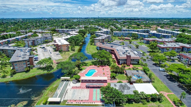 2901 NW 46th Ave Unit 101, Lauderdale Lakes, FL 33313 - drone / aerial view of a nearby body of water and apartment complex