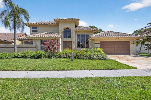 9645 Carousel Cir N, Boca Raton, FL 33434 - mediterranean / spanish-style house featuring stucco siding, an attached garage, driveway, and a tile roof