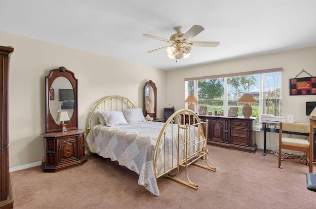 9645 Carousel Cir N, Boca Raton, FL 33434 - bedroom featuring light carpet, ceiling fan, and baseboards