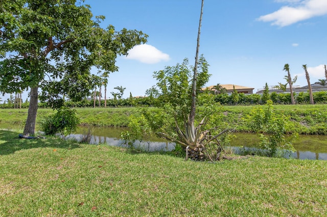9645 Carousel Cir N, Boca Raton, FL 33434 - view of grassy yard featuring a water view