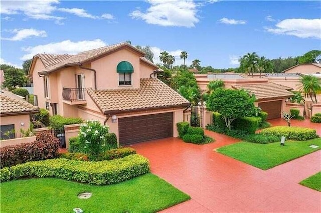 6400 Via Rosa, Boca Raton, FL 33433 - mediterranean / spanish-style house featuring stucco siding, driveway, a garage, and a tile roof