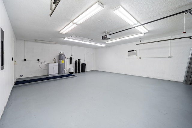 17832 43rd Rd N, Loxahatchee, FL 33470 - garage featuring electric water heater, a garage door opener, and a wall mounted AC