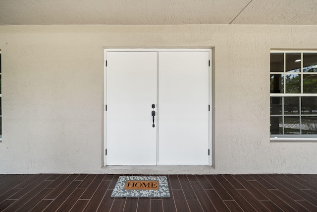 17832 43rd Rd N, Loxahatchee, FL 33470 - doorway to property featuring stucco siding