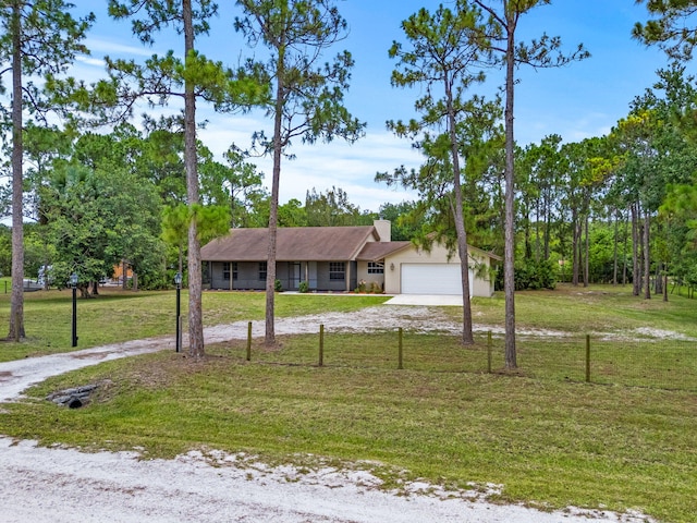 17832 43rd Rd N, Loxahatchee, FL 33470 - single story home featuring dirt driveway, a front yard, a garage, and stucco siding