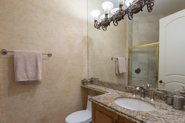 123 Grand Palm Way, Palm Beach Gardens, FL 33418 - bathroom with vanity, a shower with shower door, toilet, and a chandelier