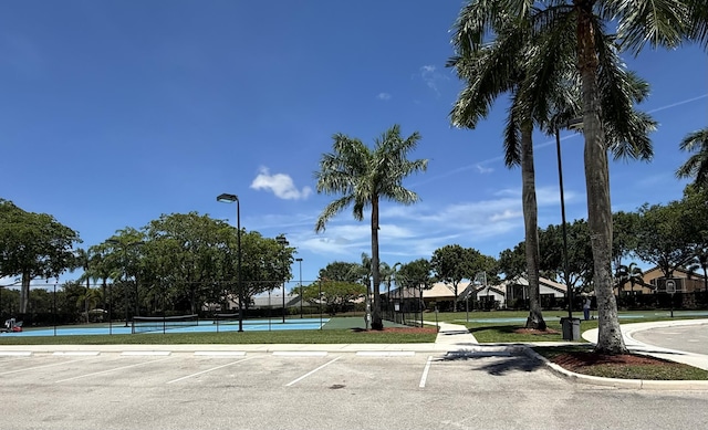 9360 Cove Point Cir, Boynton Beach, FL 33472 - view of asphalt road featuring curbs and street lighting