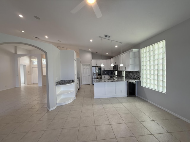 9360 Cove Point Cir, Boynton Beach, FL 33472 - kitchen with open shelves, light tile patterned floors, stainless steel refrigerator with ice dispenser, a ceiling fan, and recessed lighting