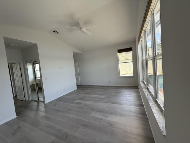 9360 Cove Point Cir, Boynton Beach, FL 33472 - empty room with ceiling fan, lofted ceiling, and dark wood-type flooring