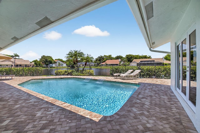3765 Canterbury Ct, Boca Raton, FL 33434 - view of swimming pool featuring a patio area and a fenced backyard