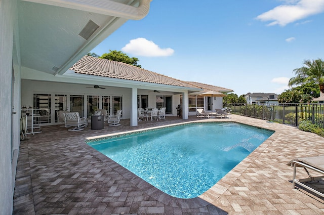 3765 Canterbury Ct, Boca Raton, FL 33434 - view of swimming pool with a ceiling fan, outdoor dining space, and a patio area