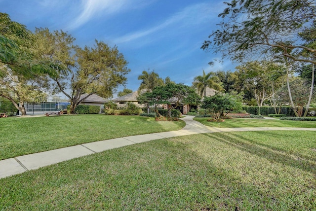 3765 Canterbury Ct, Boca Raton, FL 33434 - view of front of property with a front lawn
