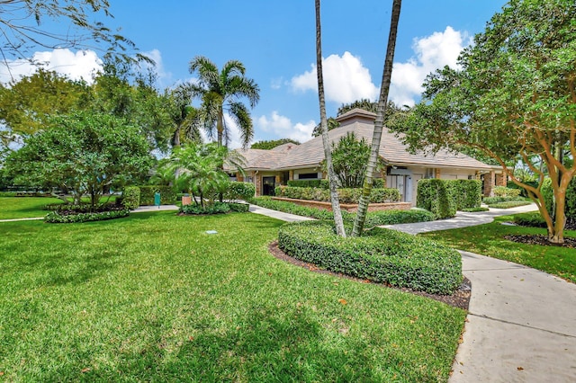 3765 Canterbury Ct, Boca Raton, FL 33434 - view of property's community with a lawn