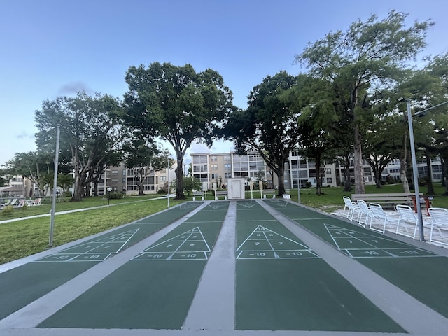 3099 NW 48th Ave Unit 163, Lauderdale Lakes, FL 33313 - view of property's community with shuffleboard and a lawn
