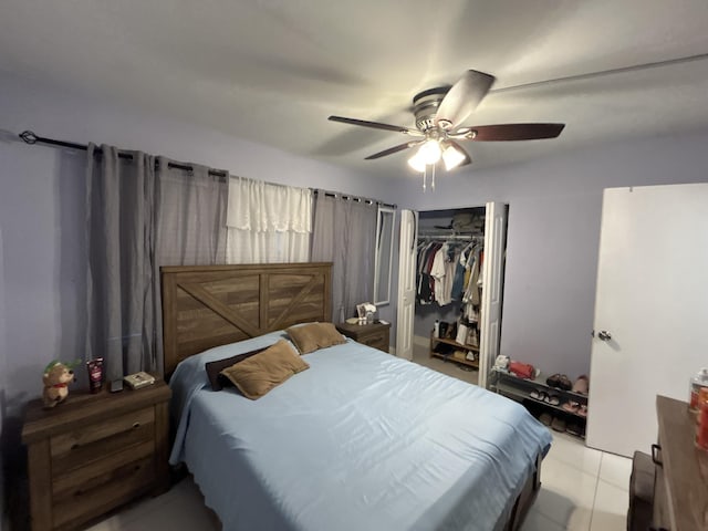 3099 NW 48th Ave Unit 163, Lauderdale Lakes, FL 33313 - bedroom with a closet, a ceiling fan, and light tile patterned floors