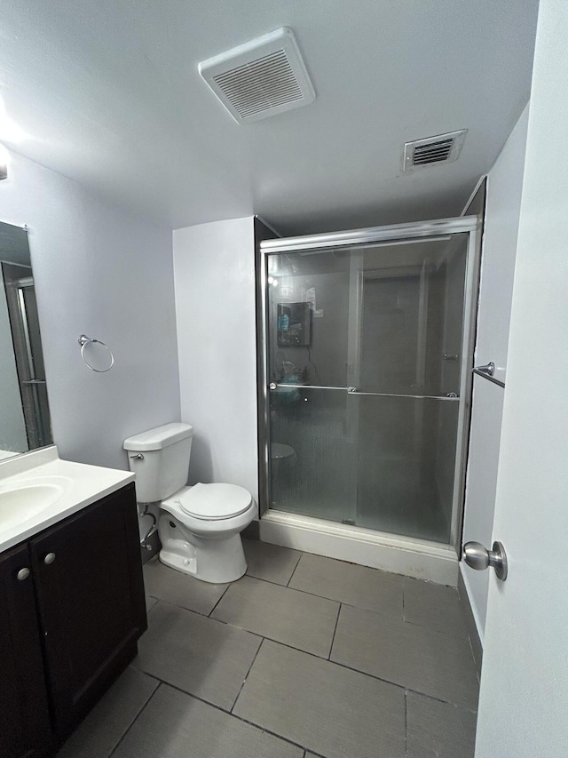 3099 NW 48th Ave Unit 163, Lauderdale Lakes, FL 33313 - full bath featuring vanity, a stall shower, and tile patterned flooring