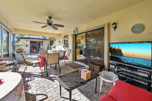 2850 NW 15th St, Delray Beach, FL 33445 - sunroom featuring a ceiling fan and outdoor dining space