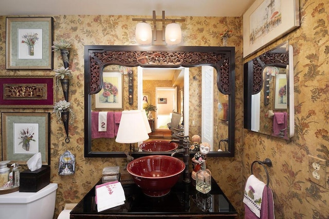 157 Capri D, Delray Beach, FL 33484 - bathroom featuring toilet and wallpapered walls