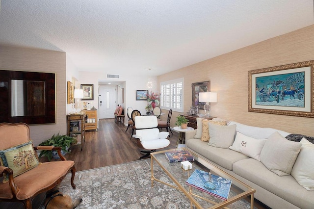 157 Capri D, Delray Beach, FL 33484 - living area with wood finished floors and a textured ceiling