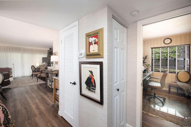 157 Capri D, Delray Beach, FL 33484 - hall featuring a desk and dark wood-style floors