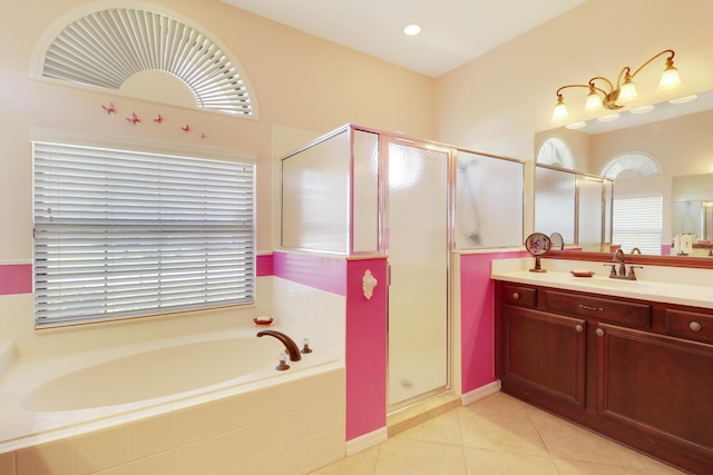 3429 SW Catskill Dr, Port Saint Lucie, FL 34953 - full bathroom with a bath, vanity, a stall shower, and tile patterned flooring