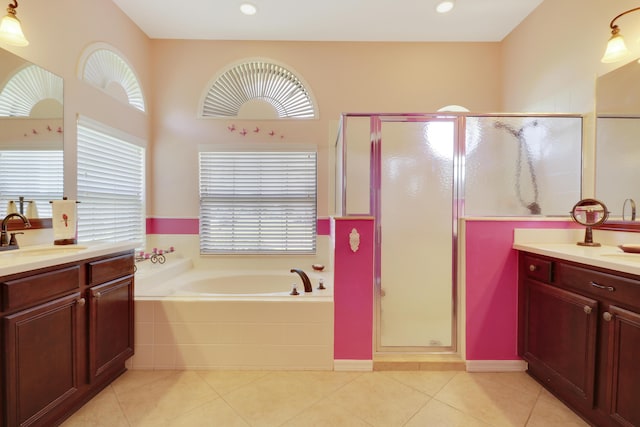 3429 SW Catskill Dr, Port Saint Lucie, FL 34953 - full bathroom with vanity, plenty of natural light, a garden tub, and a stall shower