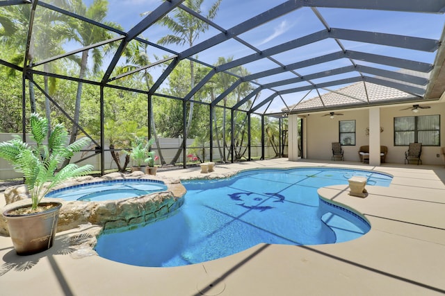 3429 SW Catskill Dr, Port Saint Lucie, FL 34953 - view of swimming pool with a ceiling fan, a patio, a pool with connected hot tub, and a lanai