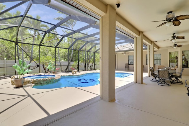 3429 SW Catskill Dr, Port Saint Lucie, FL 34953 - view of pool with a ceiling fan, a patio, a pool with connected hot tub, a fenced backyard, and a lanai